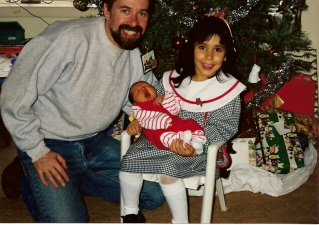 Kristen with her baby brother, Eric, at his first Christmas