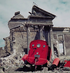 View of the ruins of the Palais de Justice in the town of St. Lo, France, summer 1944